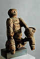 Seated Male Figure with Trophy Head Identified as Chief Mabana, Wood, Mbembe peoples